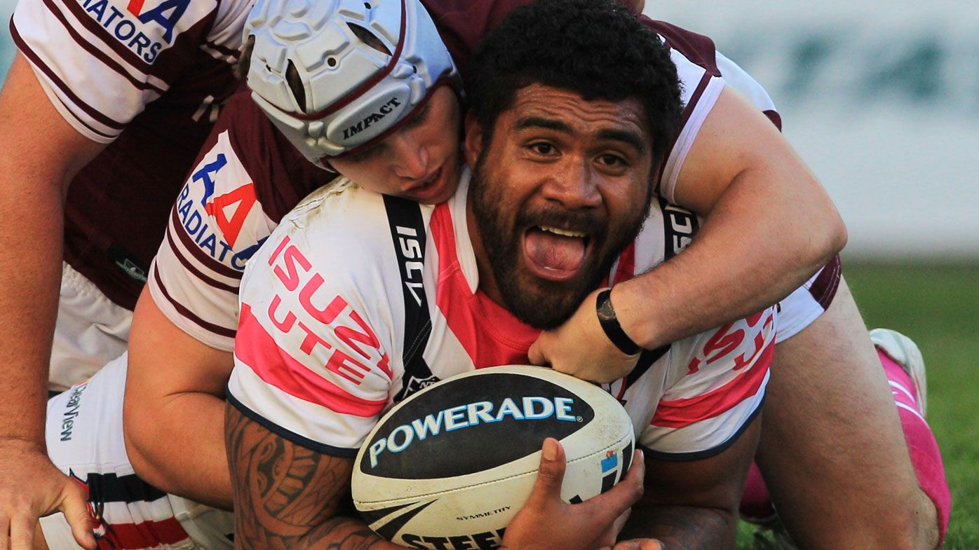 Mose Masoe takes steps on crutches after suffering serious spinal injury in game