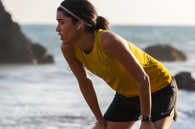 Woman wearing AirPod Pros