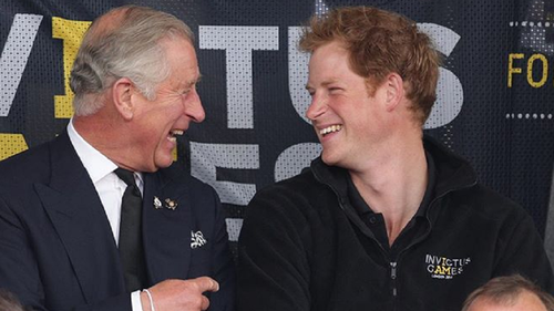 Prince Charles and Prince Harry at an Invictus Games event in 2014.