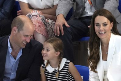 Prince William, Princess Charlotte and Kate, Duchess of Cambridge are seated to watch the swimming events, at Sandwell Aquatics Center on day five of the 2022 Commonwealth Games in Birmingham, England, Tuesday, Aug. 2, 2022 