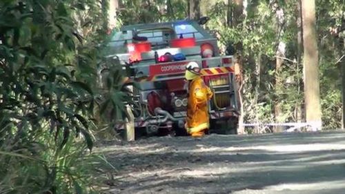 A Rural Fire Services crew was extinguishing a small blaze when they found the remains in bushland.