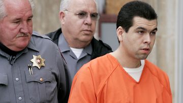 Anthony Sanchez, right, is escorted into a Cleveland County courtroom for a preliminary hearing in Norman, Okla., Feb. 23, 2005