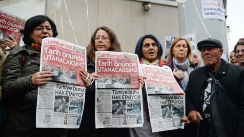 Istanbul authorities break up protests, imprison opposition newspaper staff