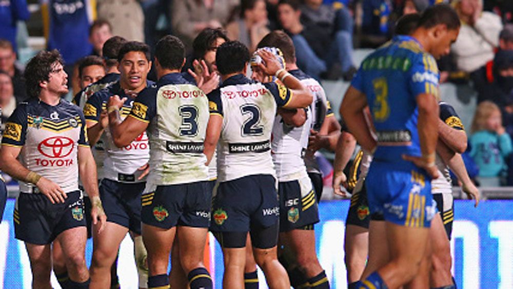Cowboys players celebrate a try against the Eels in 2015. (Getty)