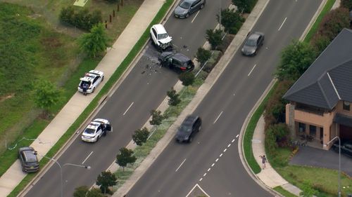 A man has been arrested after the police pursuit ended in a head-on crash in Sydney's south-west.