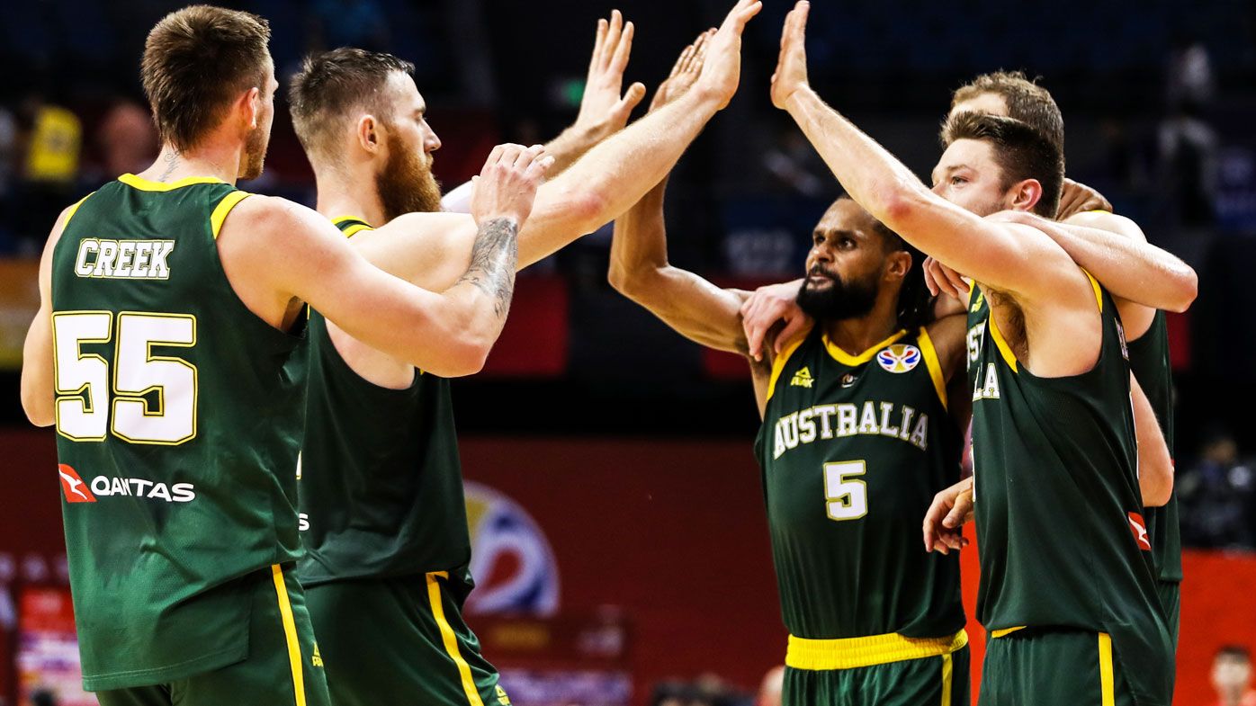 The Boomers celebrate the victory during 2nd round Group L match between Australia and France 