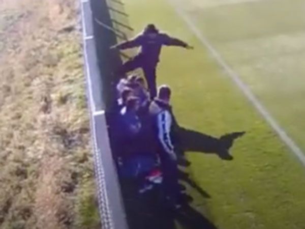 Football coach filmed kicking youth player