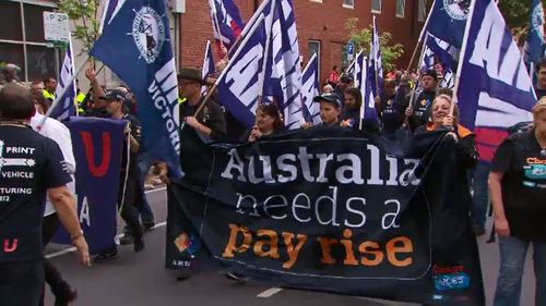 Protestors called on the government to do more for workers' rights.