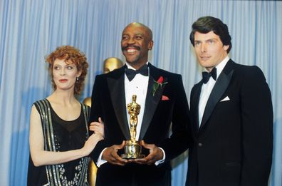 Susan Sarandon and Christopher Reeves flank Louis Gossett Jr., winner of the 1982 Academy Award for Best Supporting Actor for his role in "An Officer and a Gentleman."