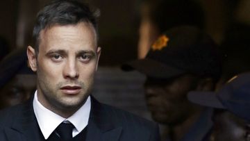FILE - In this Wednesday, June 15, 2016, file photo, Oscar Pistorius leaves the High Court in Pretoria, South Africa, after his sentencing proceedings. South African former track star Oscar Pistorius has met with the father of Reeva Steenkamp, the woman he shot to death in 2013, as part of his parole process, the Steenkamp&#x27;s family lawyer told The Associated Press on Friday July 1, 2022. (AP Photo/Themba Hadebe, File)