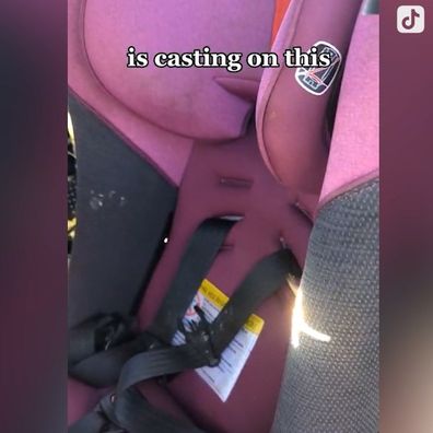 The car seat was on fire. 