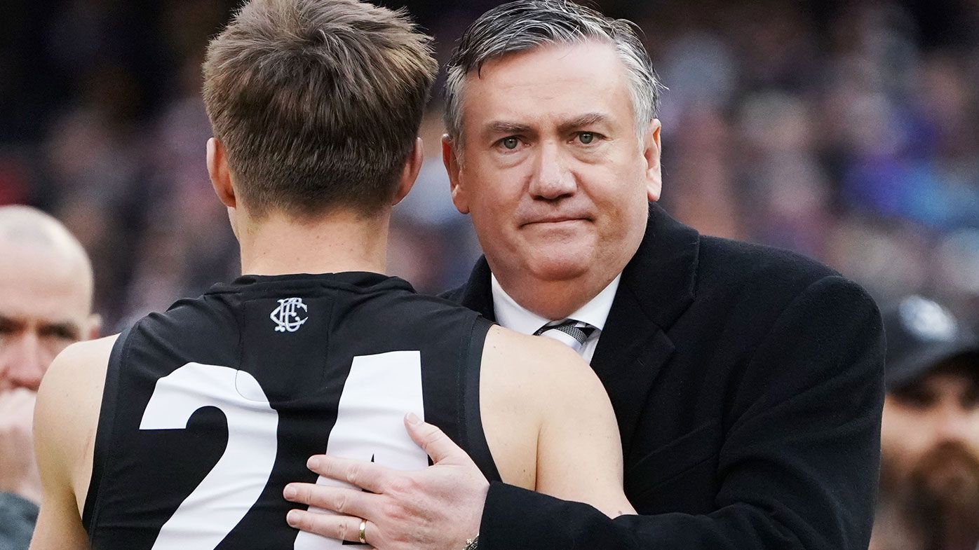  Collingwood president Eddie McGuire hugs Josh Thomas of the Magpies after their loss during the 2018 AFL Grand Final