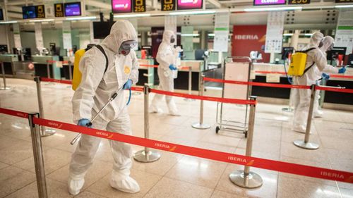 Barcelona Airport in Spain is cleaned by staff.