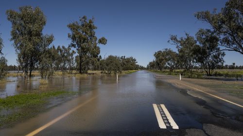 Flooded waters block road access to Wee Waa, road damage. Kamilaroi Highway.