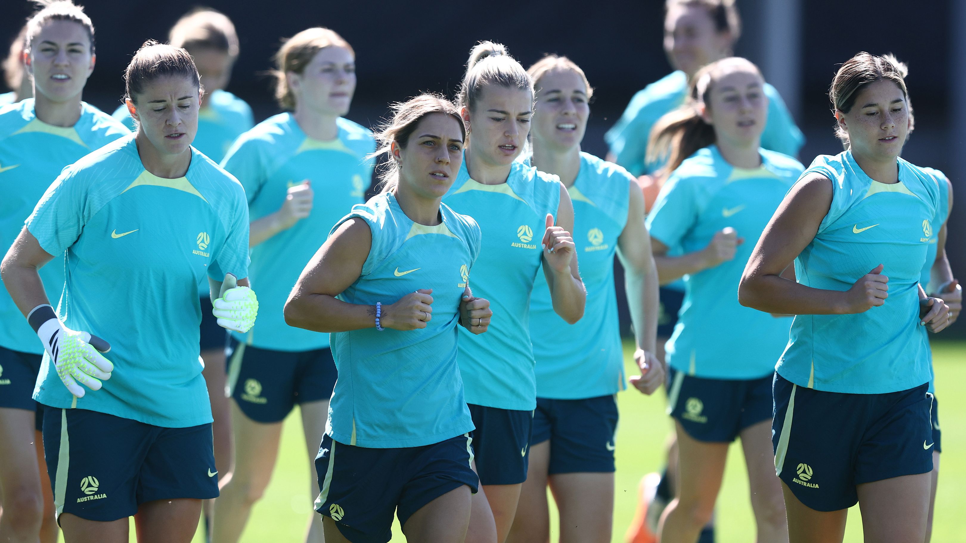 The full Matildas World Cup squad train together in Brisbane.