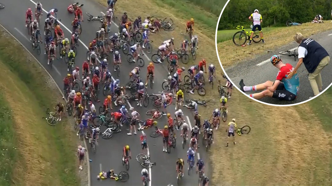 Tour de France halted by enormous pileup after rain slickens road only 5km into stage