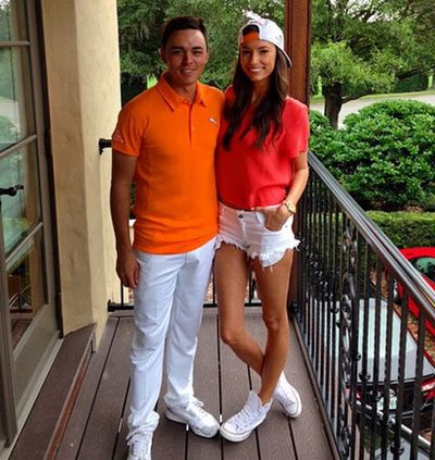Though Randock appears to do her best to match Fowler's loud golf outfits.