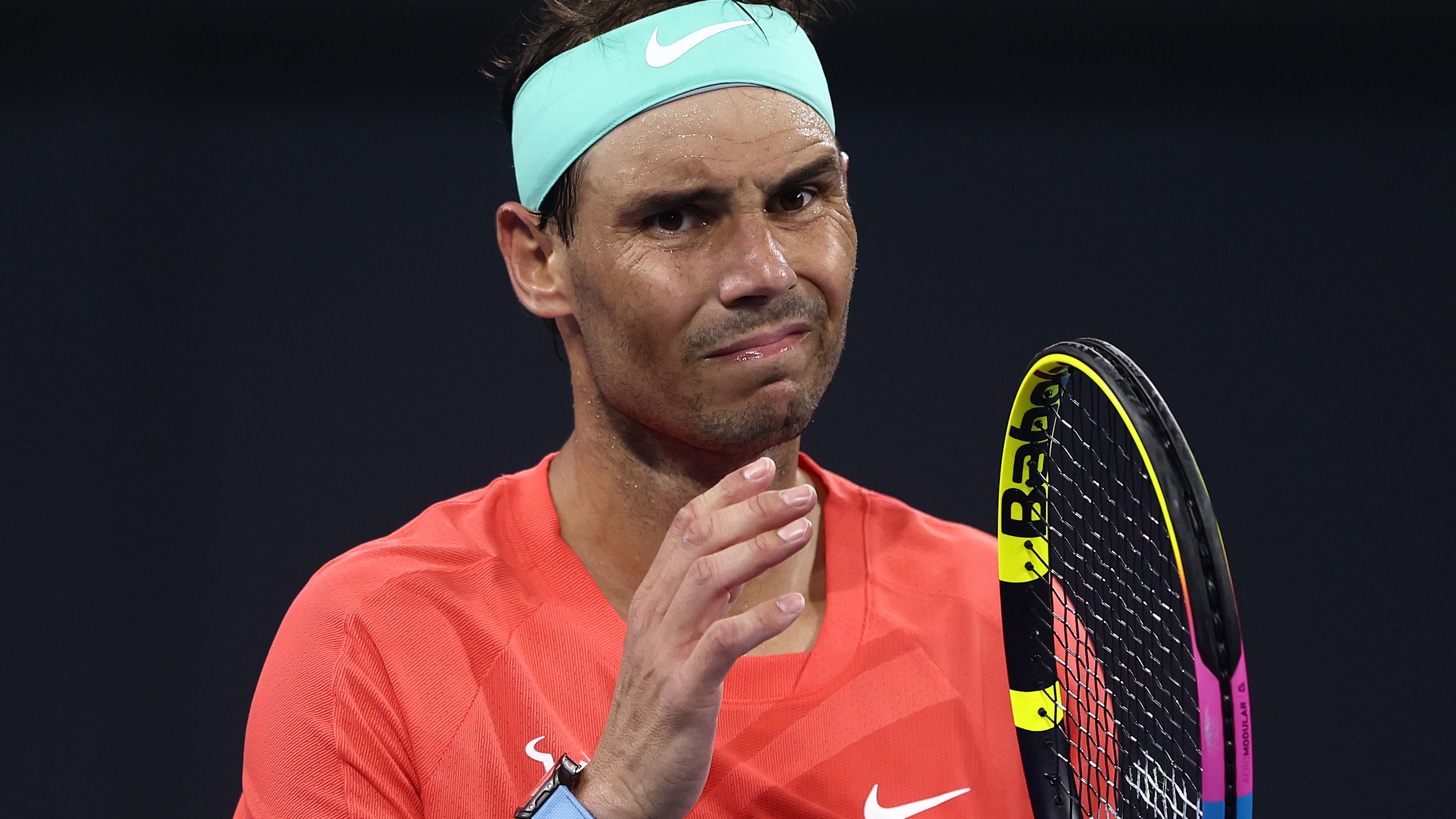 Rafael Nadal grimaces during his match against Jordan Thompson at the Brisbane International.