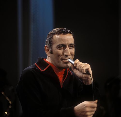 Tony Bennett performs live on stage at Elstree Studios for an Associated Television (ATV) broadcast in 1962. 