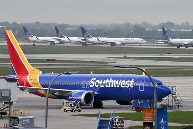 The pilot of a Southwest Airlines flight threatened to cancel takeoff after someone on the plane sent a naked photograph to other passengers.