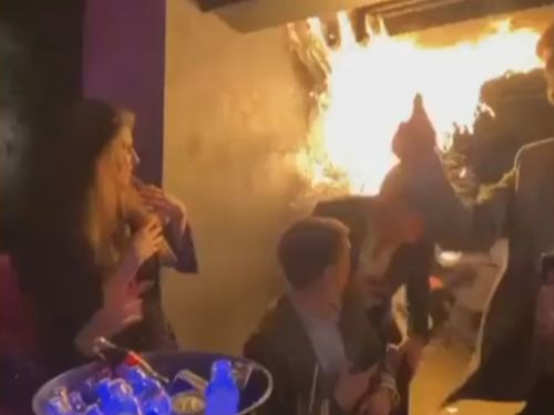 Diners fled after a Christmas tree caught fire at a lavish London restaurant.Flames can be seen in footage taken at MNKY HSE in the ﻿upmarket Mayfair area.