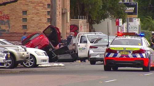 Four people hospitalised from car crash in Hamilton following police pursuit.