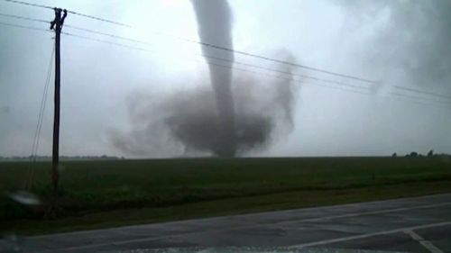 At least 21 tornadoes have been reported across the central USA.