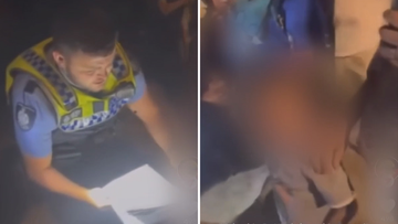 Video shows police officer serving VRO to a young boy in Mirrabooka, Western Australia.