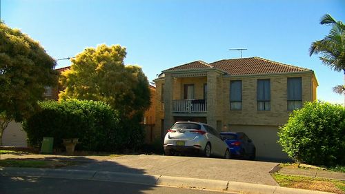 A neighbour told 9News she heard a loud bang and then screaming at the home.