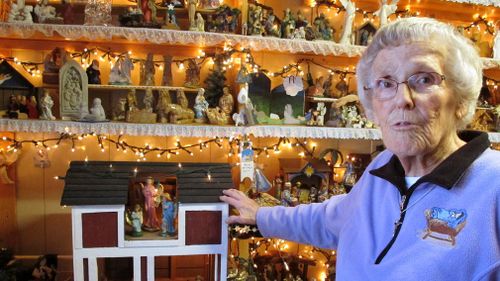 More than 1400 miniature nativity scenes of Jesus, Mary and Joseph cover every surface of Ms Squires' home. (AAP)