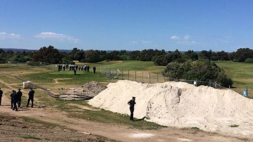 Police search Adelaide golf course after discovery of human bones