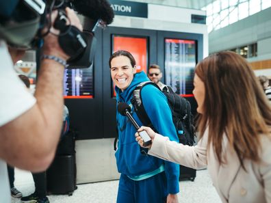 Lydia Williams arrives with the Matildas in Sydney ahead of Wednesday nights semi-final at Stadium Australia, Sydney Domestic Airport, Sunday 13th of August 2023. 