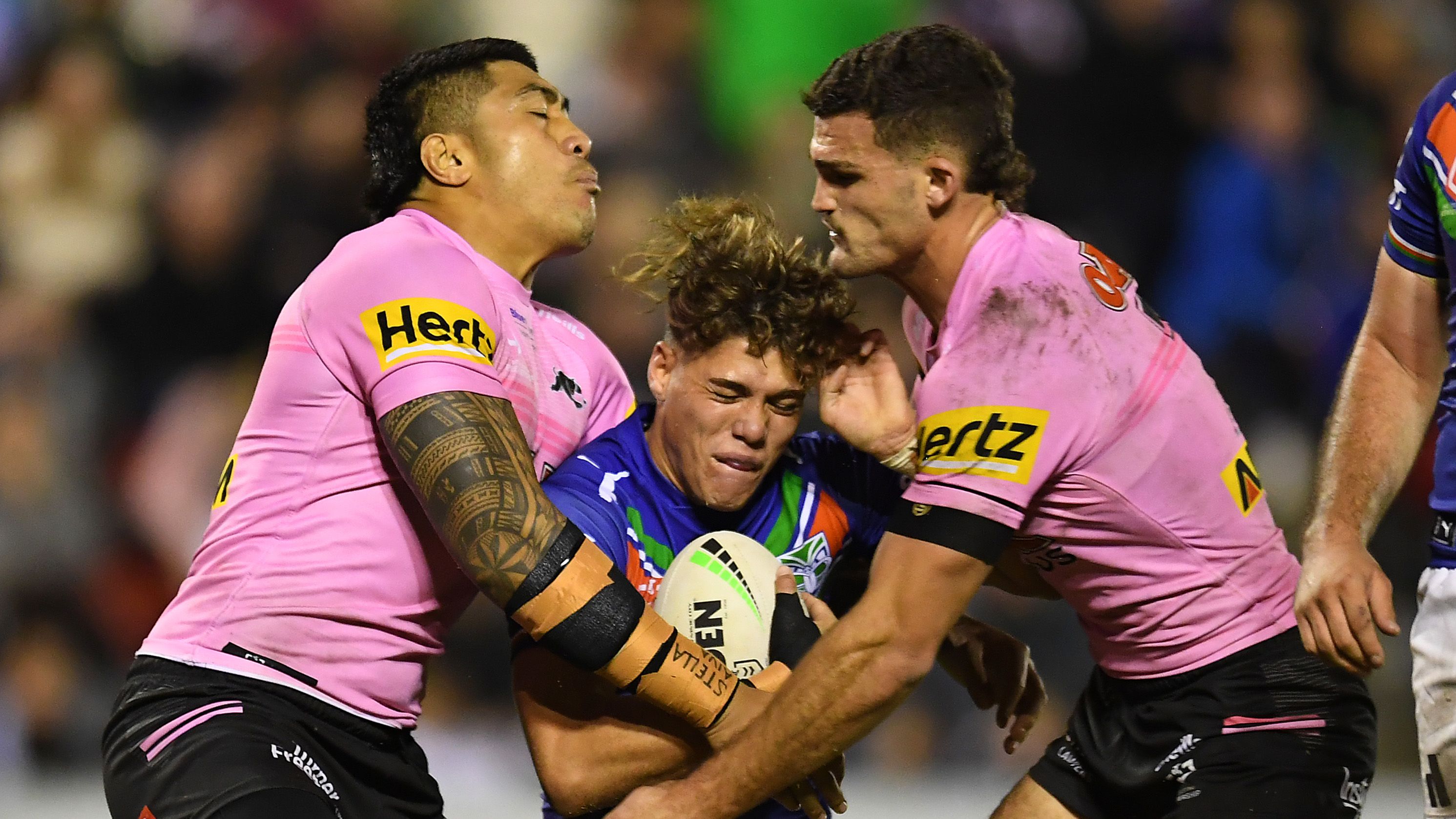 Reece Walsh of the Warriors is tackled during the round 15 NRL match between the New Zealand Warriors and the Penrith Panthers at Moreton Daily Stadium, on June 18, 2022, in Brisbane, Australia. (Photo by Albert Perez/Getty Images)