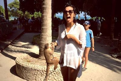 After spending Christmas in Cabo, Mexico, with Jose Antonio Baston, Eva and her beau brought their holiday spirit to Colombia. <br><br>@evalongoria: This monkey bit me! #Goodtimes #CuteThough