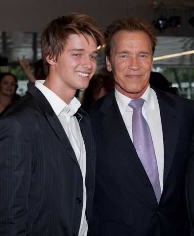 Patrick Schwarzenegger with his dad Arnold Schwarzenegger in 2011.