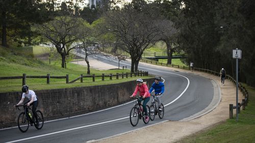 People exercising in Parramatta park, Sydney.