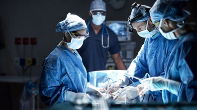 Hospital surgery operating theatre doctors nurses surgeons