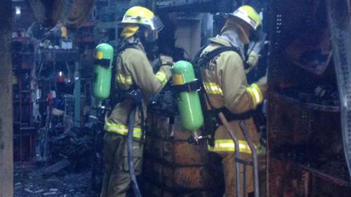 Firefighters at the scene after the blaze was contained. (NSW Fire & Rescue)