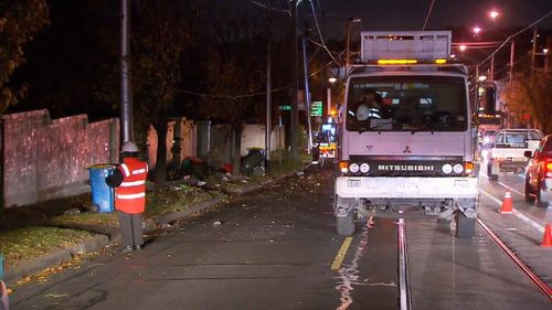 Several rubbish bins were taken out in the crash. (9NEWS)