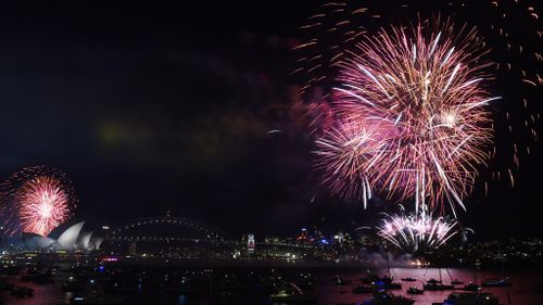 Sydney Harbour lights up ahead of the New Year's fireworks extravaganza