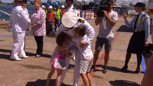 Children were quick to give their parents a long overdue big hug (9NEWS)