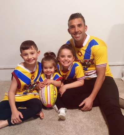 Braith Anasta and children wearing jerseys