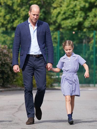 Prince William holds Princess Charlotte's hand 