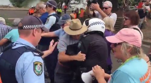 A group of protesters were pushed by police in Windsor. (Facebook)