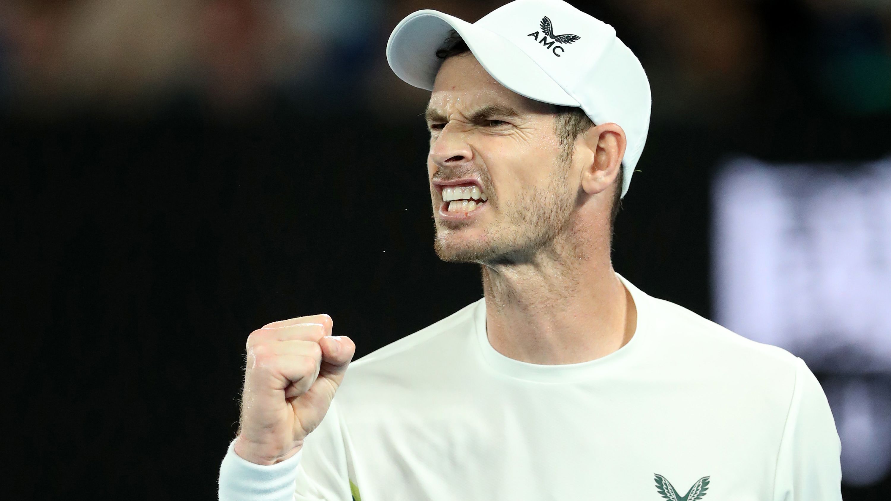 MELBOURNE, AUSTRALIA - JANUARY 17: Andy Murray of Great Britain reacts in their round one singles match against Matteo Berrettini of Italy during day two of the 2023 Australian Open at Melbourne Park on January 17, 2023 in Melbourne, Australia. (Photo by Kelly Defina/Getty Images)