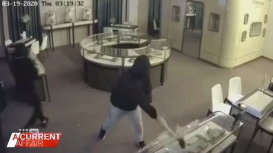 The alleged armed robbery seen on camera.