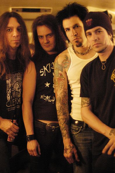 Rock band Skid Row (L-R) Scott Hill, Johnny Solinger, Phil Varone, Rachel Bolan poses for a portrait at the Whisky a Go Go in Los Angeles, California on March 10, 2004.