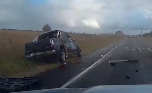 The car flipped three times but landing upright on the opposite side of the road. (Dash Cam Owners Australia)
