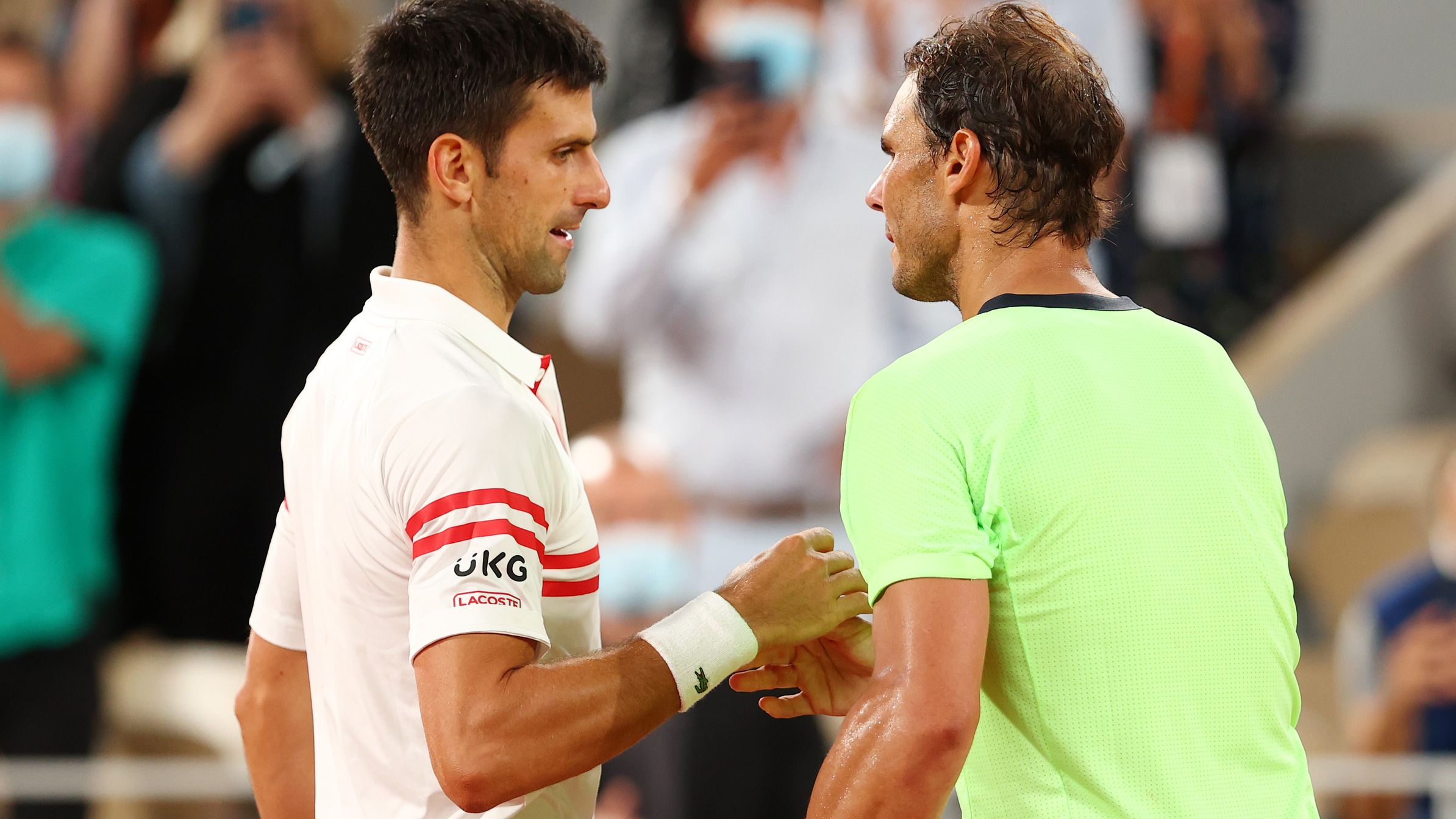 Novak Djokovic of Serbia shakes hands with Rafael Nadal of Spain.