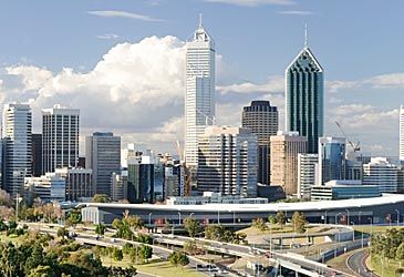 Which company's logo is at the top of Central Park, Perth's tallest building?